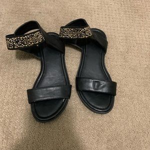 Girls slip on black sandals